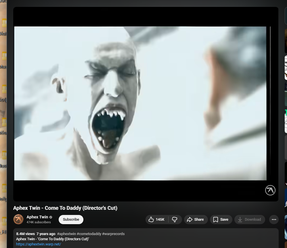 A badly cropped photo of Aphex Twin's Come to Daddy music video on youtube