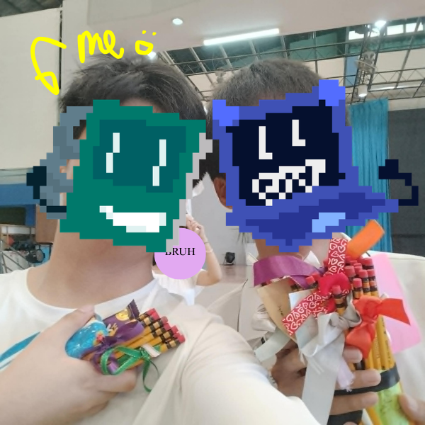 A real-life picture of me and my friend showing off our gifts after the program, Im the notebook and he is the laptop. too bad there was a photobomber so they're also censored X(